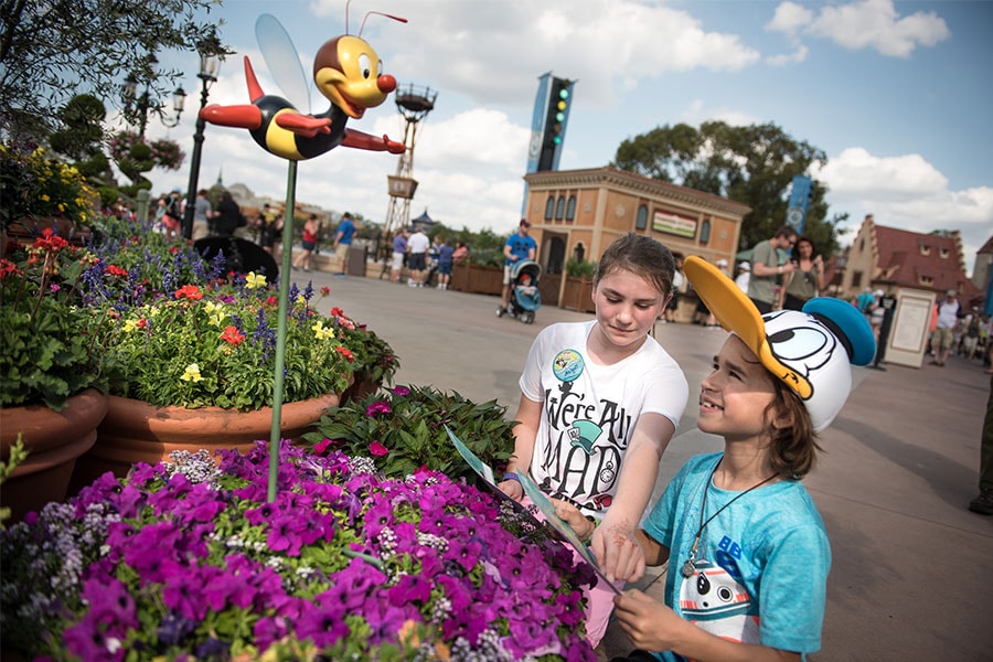 Kids enjoying Spike’s Pollination Exploration during the EPCOT International Flower & Garden Festival