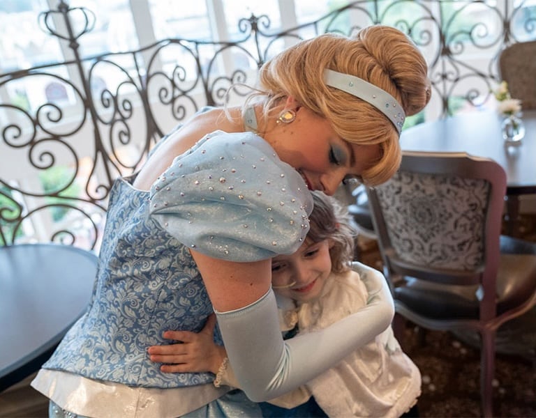 Make-A-Wish kid Marie with Cinderella at the opening of Disneyland Hotel at Disneyland Paris