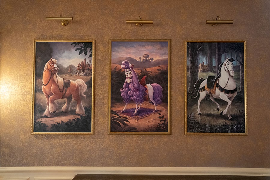 Artwork featuring different Disney horses in the Royal Banquet at Disneyland Hotel in Paris