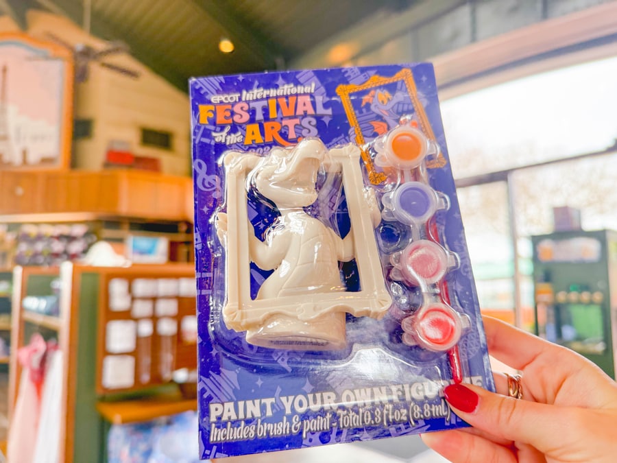 Image of Figment scavenger hunt prize paint your own figurine at 2024 EPCOT International Festival of the Arts