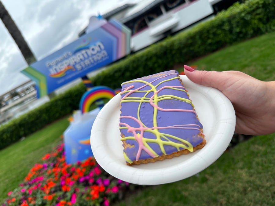 Image of Figment Blueberry-filled Pastry Tart with purple icing at EPCOT International Festival of the Arts