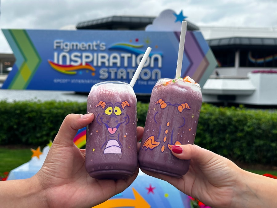 Image of Figment Grape Smoothie with freeze dried SKITTLES bite sized candies (Non-alcoholic beverage) and souvenir Figment cup at EPCOT International Festival of the Arts