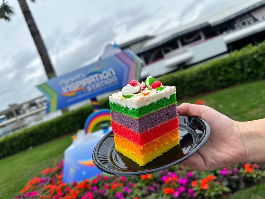 Image of Figment Rainbow Cake with freeze dried SKITTLES bite sized candies at EPCOT International Festival of the Arts