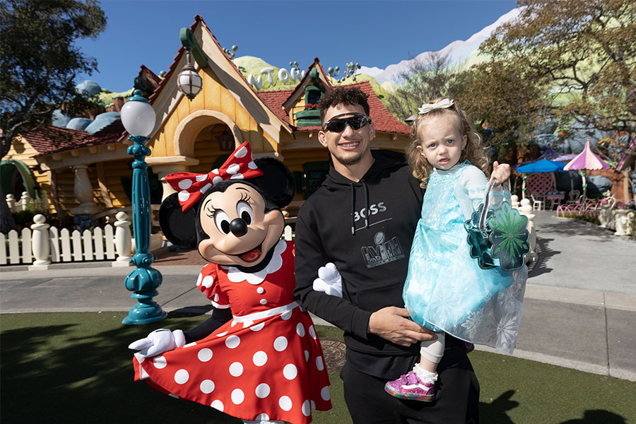 Super Bowl MVP Patrick Mahomes with daughter and Minnie Mouse at Disneyland park