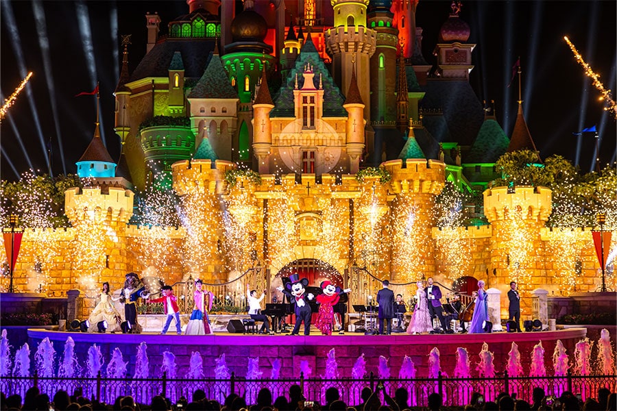 Pianist Lang Lang preforming in front of Castle of Magical Dreams at Hong Kong Disneyland
