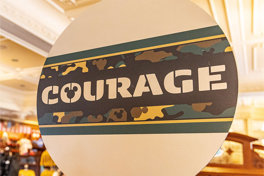 A sign that reads Courage found at Magic Kingdom Park