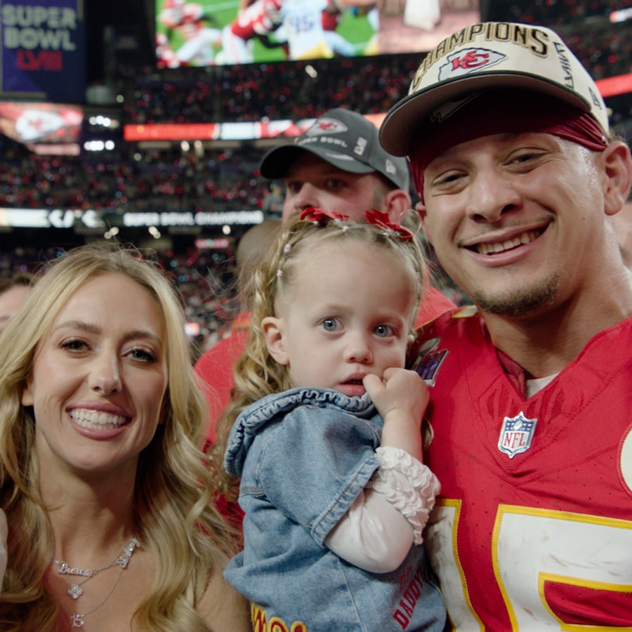 Image of Patrick Mahomes and his family after winning Super Bowl LVIII and announces his family is going to Disneyland
