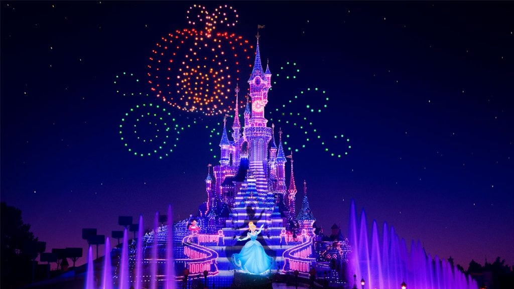 Drones creating Cinderella's pumpkin coach during the “Disney Electrical Sky Parade!” at Disneyland Paris