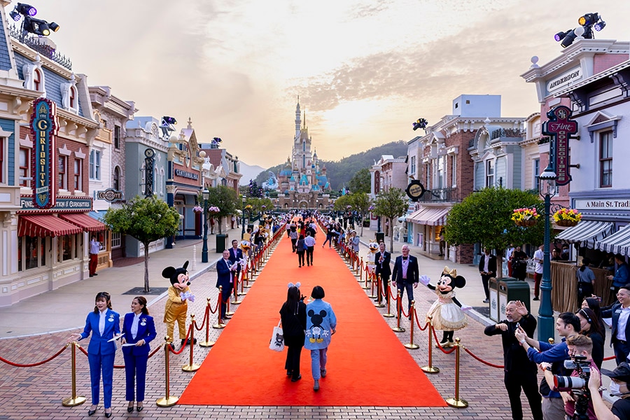Cast Members are greeted by Mickey Mouse and friends while walking down the red carpet to the “Castle of Magical Dreams”.