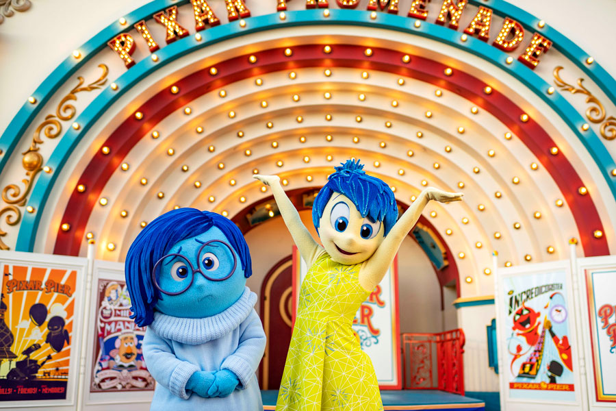 Joy and Sadness from Disney and Pixar’s “Inside Out,” during Pixar Fest character meet and greet 