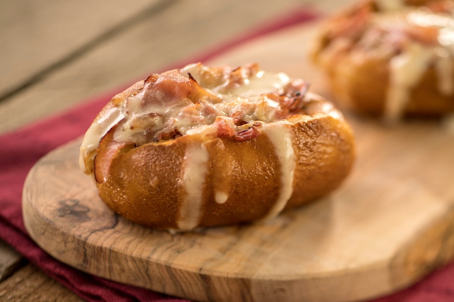 Toasted Pretzel Bread Topped with Black Forest Ham and Melted Cheese at Bauernmarkt: Farmer’s Market at the EPCOT International Flower & Garden Festival now through May 27, 2024