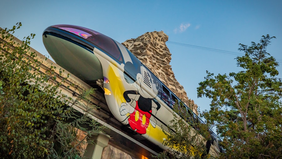 Image of The Disneyland Resort Monorail is seen passing by the Matterhorn 