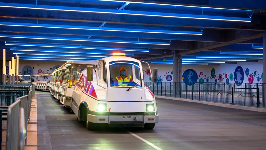Image of Disneyland Tram vehicle is seen in the passenger loading zone in the Mickey and Friends parking structure