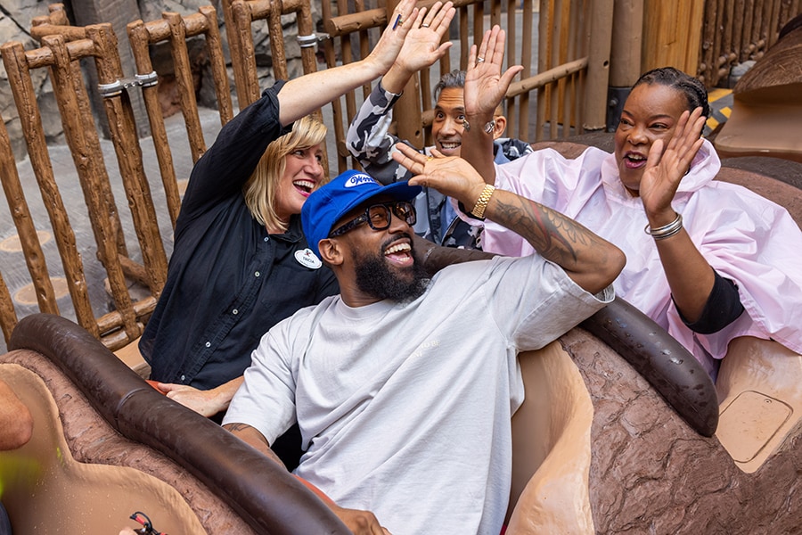 PJ Morton rides Tiana's Bayou Adventure with the project team