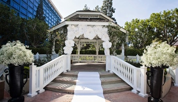 California Weddings Disney S Fairy Tale Weddingscalifornia Wedding Gazebo At Disneyland Hotel