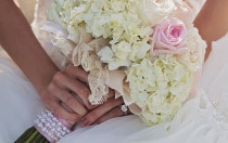 A bride holding a bridal bouquet