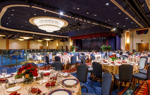 Many chairs face a gazebo in an outside courtyard Many chairs face a gazebo in an outside courtyard