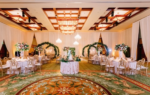 Many chairs face a gazebo in an outside courtyard Many chairs face a gazebo in an outside courtyard