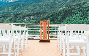 Folding chairs on the deck of ship overlooking a hillside Folding chairs on the deck of ship overlooking a hillside