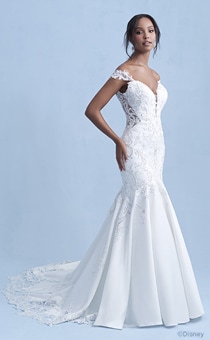 A woman in the Jasmine wedding gown from the 2021 Disney Fairy Tale Weddings Collection