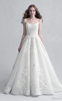 A woman in the Aurora wedding gown from the 2021 Disney Fairy Tale Weddings Platinum Collection