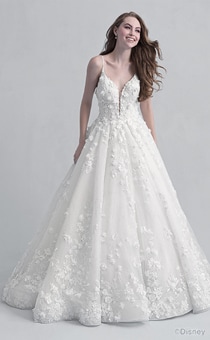 A woman in the Snow White wedding gown from the 2021 Disney Fairy Tale Weddings Platinum Collection