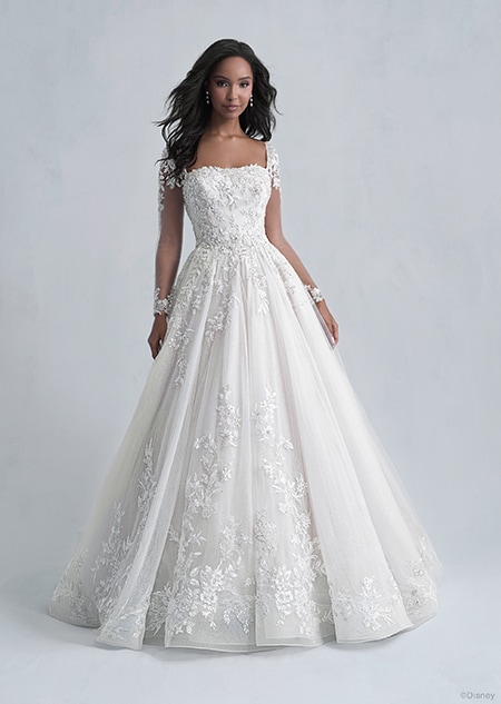 A woman wearing the Belle wedding gown from the 2021 Disney Fairy Tale Weddings Platinum Collection