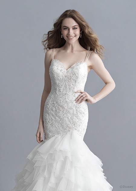 A woman in the Ariel wedding gown from the 2020 Disney Fairy Tale Weddings Platinum Collection A woman in the Ariel wedding gown from the 2020 Disney Fairy Tale Weddings Platinum Collection