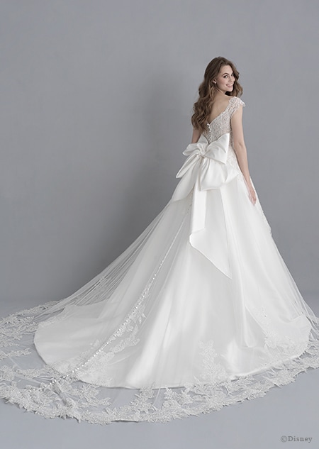 A back side view of a woman in the Snow White wedding gown from the 2020 Disney Fairy Tale Weddings Platinum Collection