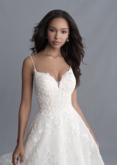 A woman dressed in the Tiana wedding gown from the 2020 Disney Fairy Tale Weddings Platinum Collection