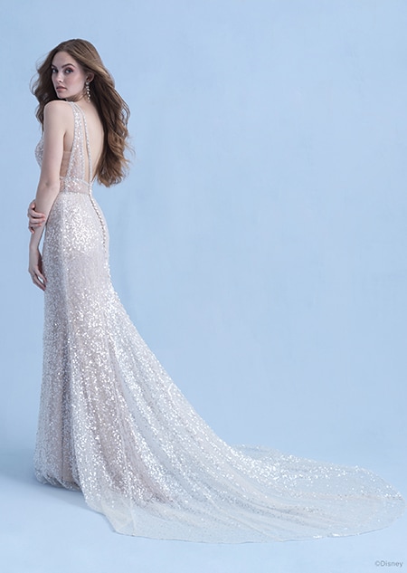 A back side view of a woman in the Ariel wedding gown from the 2021 Disney Fairy Tale Weddings Collection