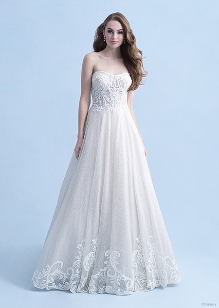 A woman wearing the Cinderella wedding gown from the 2021 Disney Fairy Tale Weddings Collection