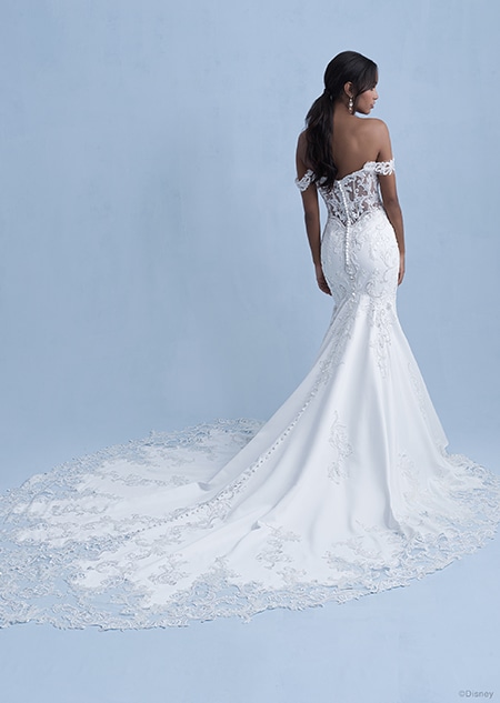 A back side view of a woman wearing the Jasmine wedding gown from the 2021 Disney Fairy Tale Weddings Collection