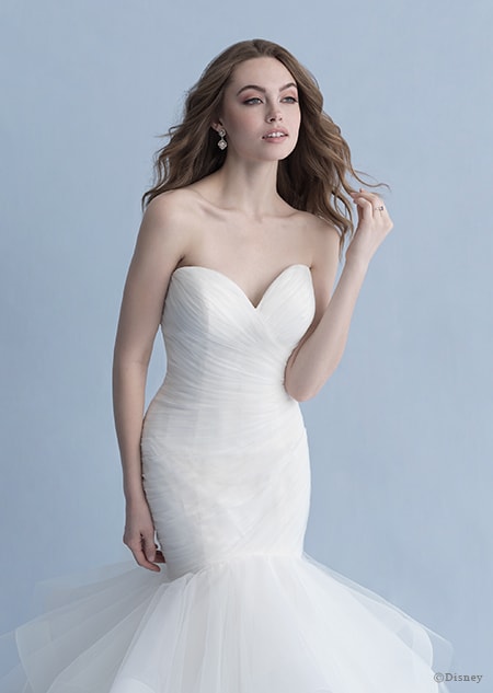 A woman wearing the Ariel wedding gown from the 2020 Disney Fairy Tale Weddings Collection