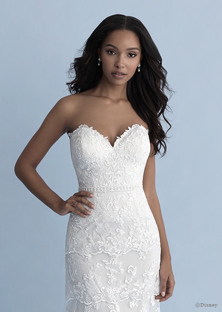 A woman wearing the Tiana wedding gown from the 2020 Disney Fairy Tale Weddings Collection A woman wearing the Tiana wedding gown from the 2020 Disney Fairy Tale Weddings Collection