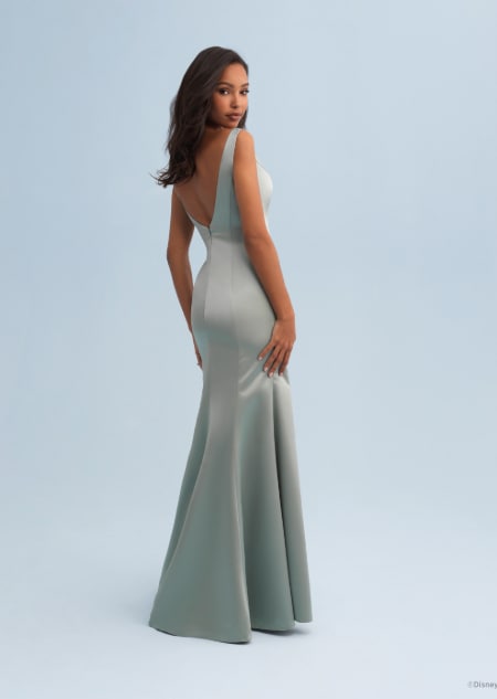 The back of a woman wearing a Jasmine themed bridesmaid dress with an open back