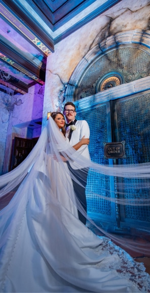 A couple posing in front of the elevator doors at The Twilight Zone Tower of Terror at Disney's Hollywood Studios A couple posing in front of the elevator doors at The Twilight Zone Tower of Terror at Disney's Hollywood Studios