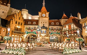 Two sections of chairs facing tall buildings in the Germany Pavilion Two sections of chairs facing tall buildings in the Germany Pavilion