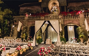 Chairs, flowers and an altar set up in front of the Hollywood Tower Hotel