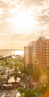The pool area and ocean at Aulani, A Disney Resort & Spa in Ko Olina, Hawaiʻi The pool area and ocean at Aulani, A Disney Resort & Spa in Ko Olina, Hawaiʻi