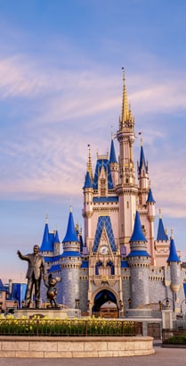 The Partners statue near Cinderella Castle at Magic Kingdom park The Partners statue near Cinderella Castle at Magic Kingdom park