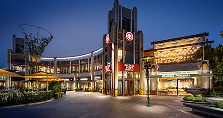 Downtown Disney at night featuring Ballast Point Brewing Co and Black Tap Craft Burgers and Shakes
