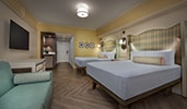 A Guest room with 2 queen beds, facing the entryway, at Disney's Boardwalk Inn
