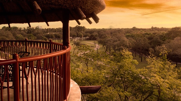 The balcony of a guest room overlooking the savanna