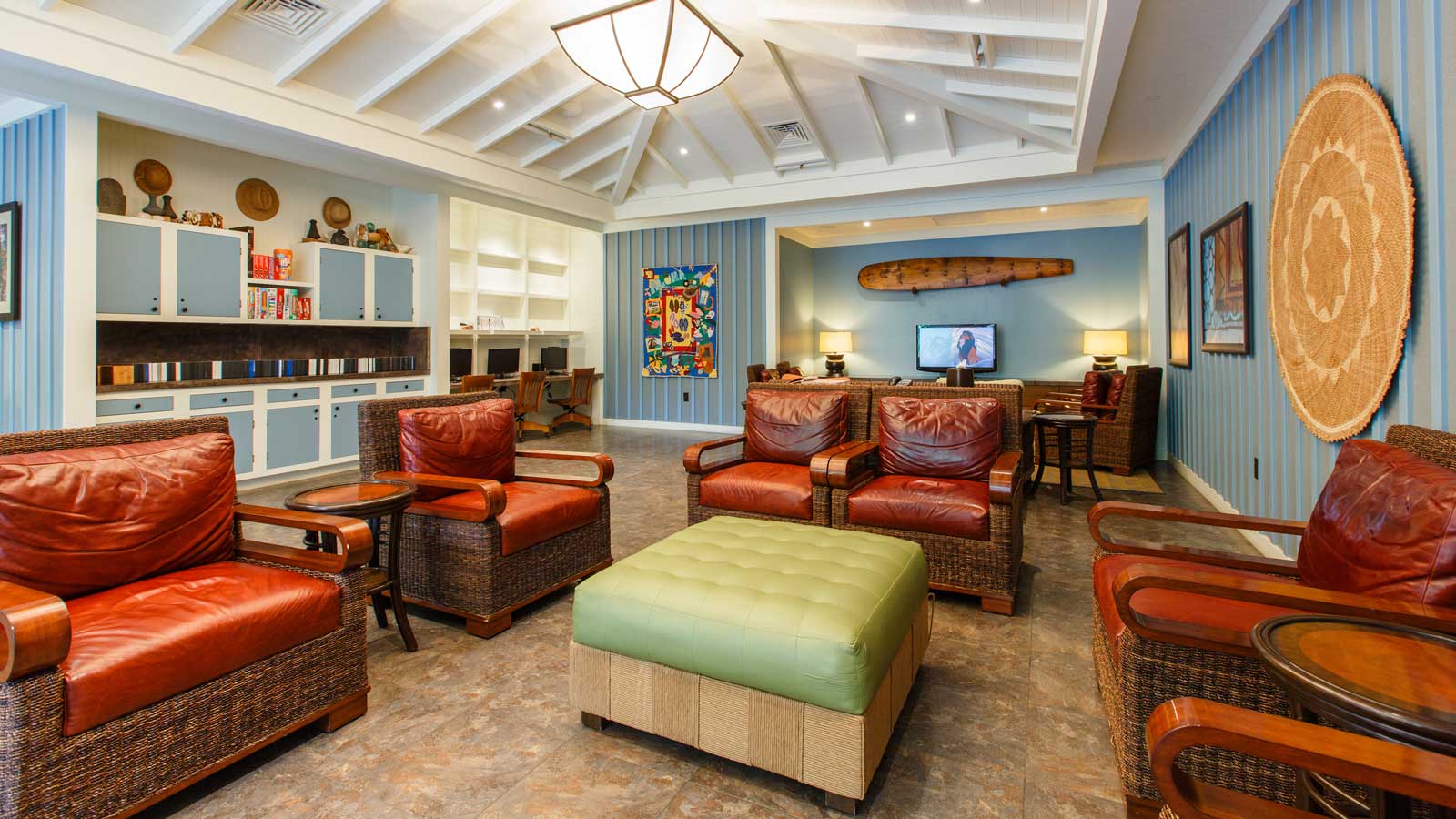 A seating area at Pau Hana Room at Aulani