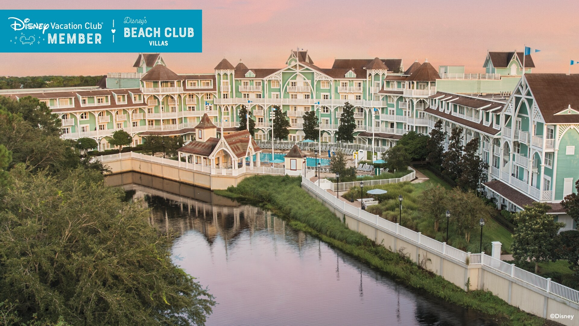 Disney’s Beach Club Villas, fronting the edge of a placid lake, over which a banner reads, ‘Disney Vacation Club Member, Disney’s Beach Club Villas’
