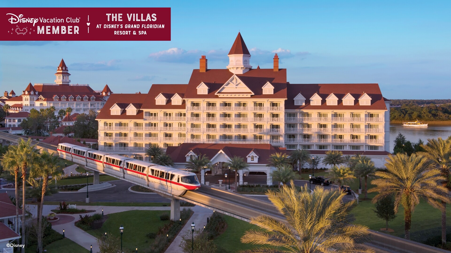 The monorail, passing in front of the Villas, over which a banner reads, ‘Disney Vacation Club Member, The Villas at Disney’s Grand Floridian Resort and Spa’
