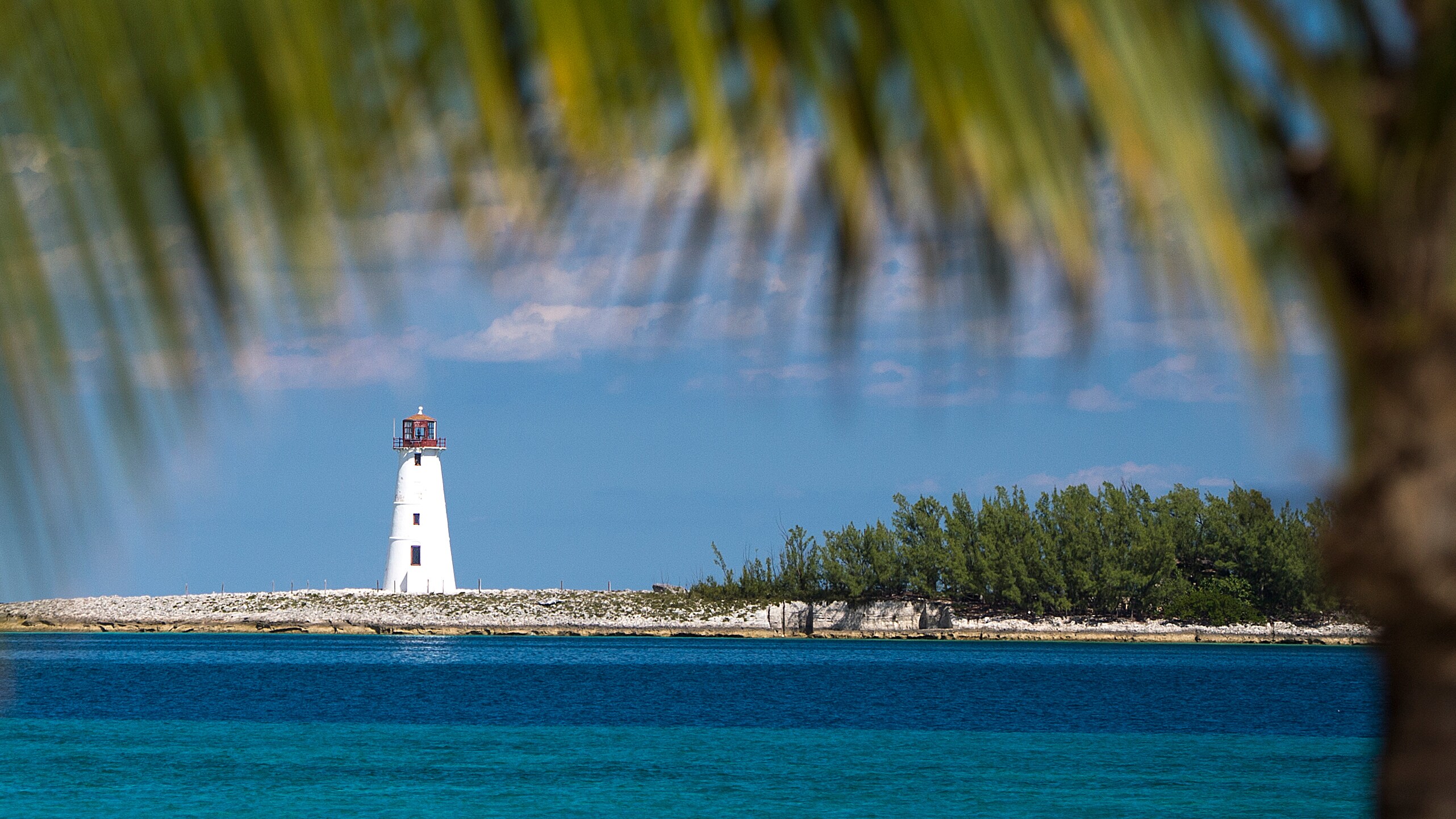 Hog Island Lighthouse and the surrounding waters of Nassau Harbour in the Bahamas