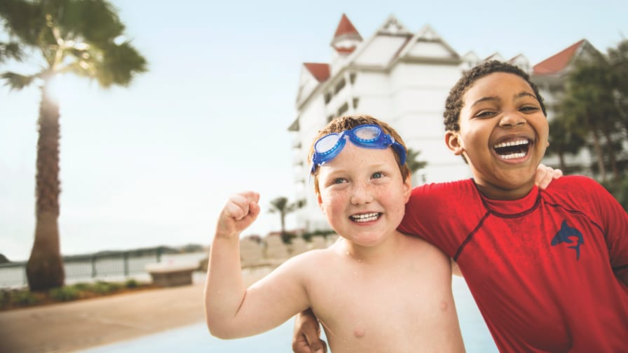 Two young boys in swim attire at Disney's Grand Floridian Resort & Spa in Florida