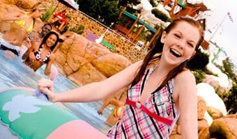 Disney's Blizzard Beach Water Park A teenage girl enjoys the water at Melt-Away Bay in Disney's Blizzard Beach water park